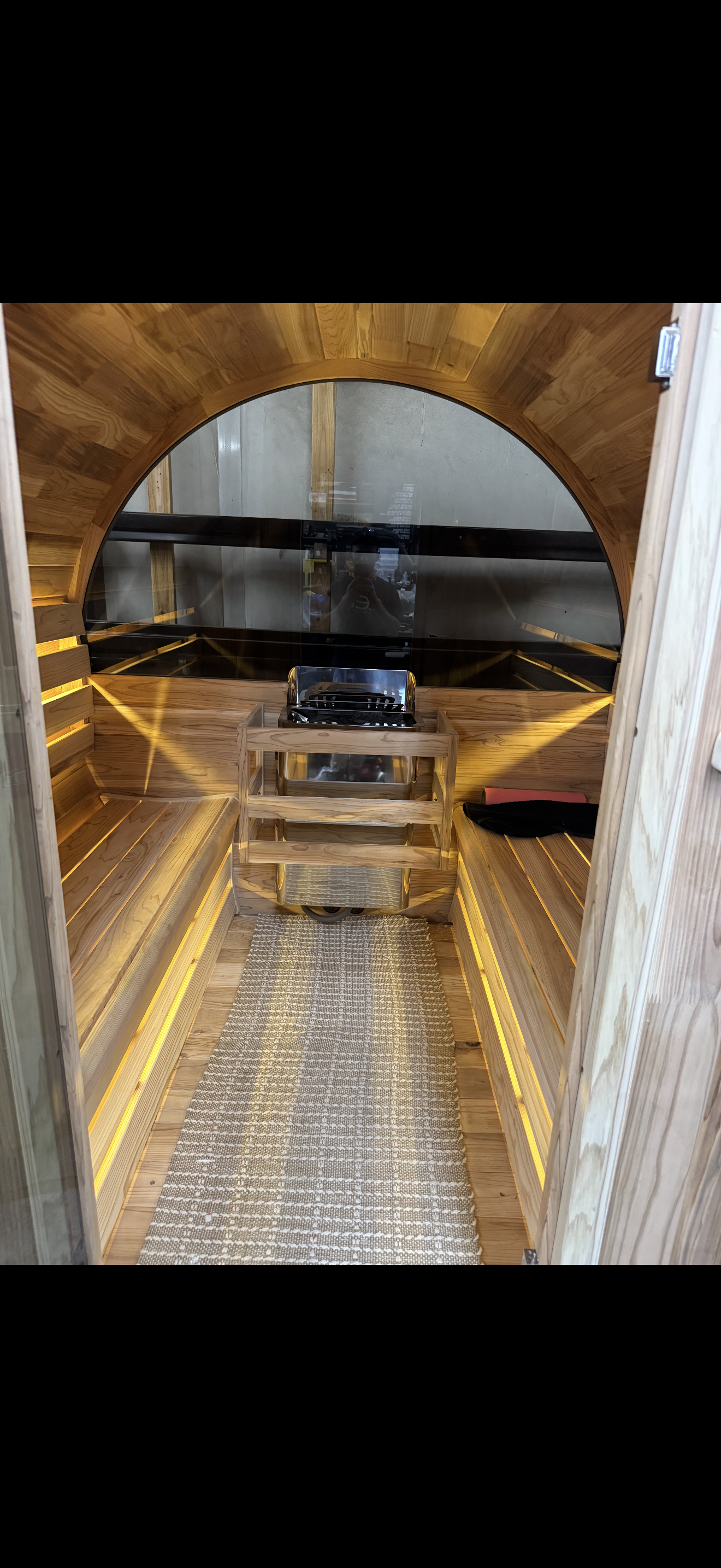 Custom cedar sauna interior with integrated warm lighting